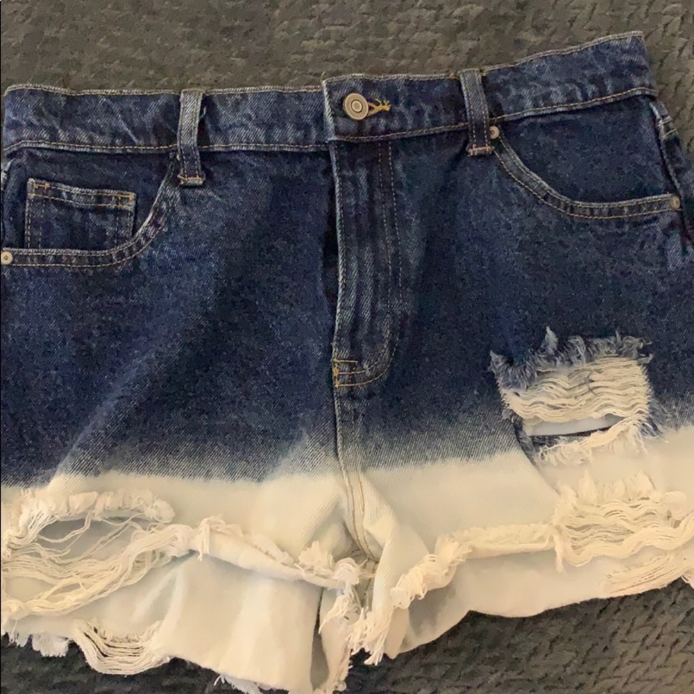 Two tone distressed jean shorts